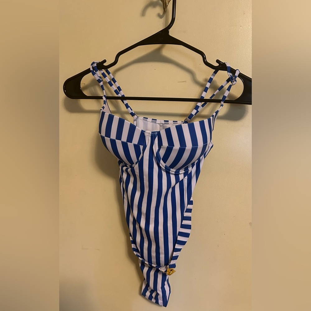 Blue stripped swimsuit with belt.